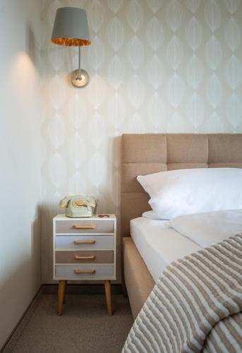 Katil atau katil-katil dalam bilik di Hotel Sonnenhof Teinachtal