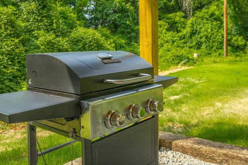 an outdoor grill with a stove top in a yard at 07 The Gio Room - A PMI Scenic City Vacation Rental in Chattanooga