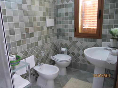 Kúpeľňa v ubytovaní Residence Olbia