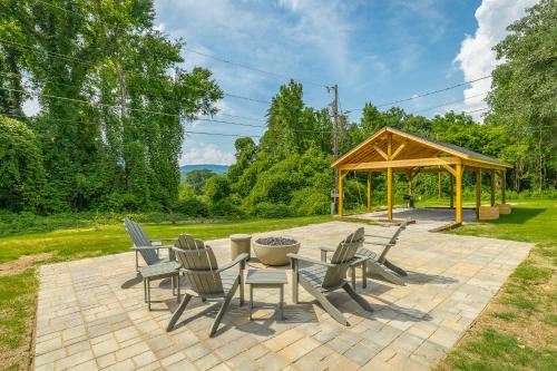 a patio with a table and chairs and a pavilion at 11 The Charlotte Room - A PMI Scenic City Vacation Rental in Chattanooga