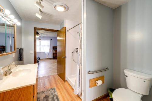 a bathroom with a toilet and a shower at Cozy West Virginia Home about 13 Mi to Kanawha River in Hurricane