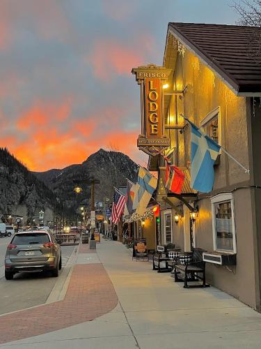 a street in a town with a sign for a motel at Frisco Lodge in Frisco