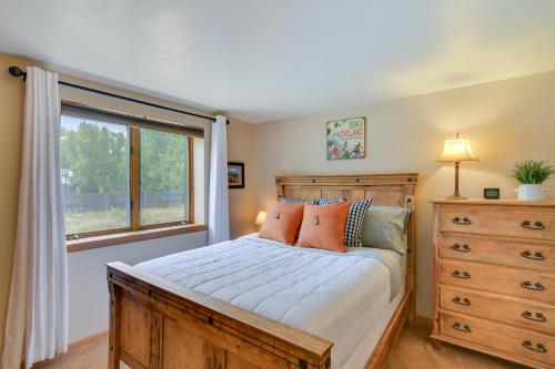 a bedroom with a bed and a window and a dresser at Bright Ranch-Style Retreat in Downtown Buena Vista in Buena Vista