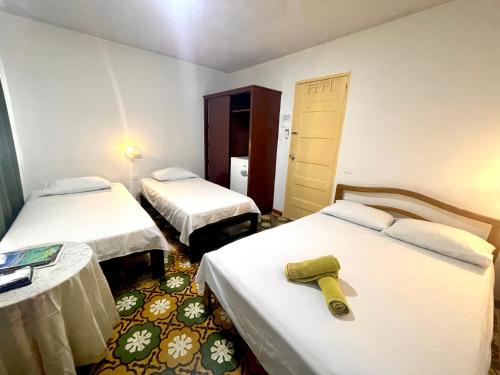 Postel nebo postele na pokoji v ubytování Mr. Tenloy's Place