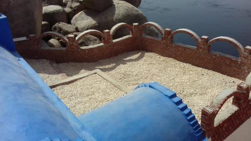 a water slide in the middle of a playground at HoneyMoonnaka Guest House Nubian ( بيت هانى ) in Aswan