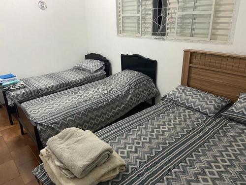 Ένα ή περισσότερα κρεβάτια σε δωμάτιο στο Casa Martino