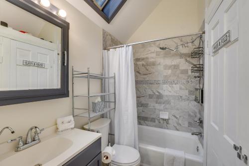 a bathroom with a sink and a toilet and a shower at South Salem Vacation Rental with Furnished Deck! in South Salem