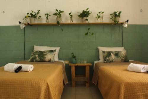 Tempat tidur dalam kamar di Casa Palmita