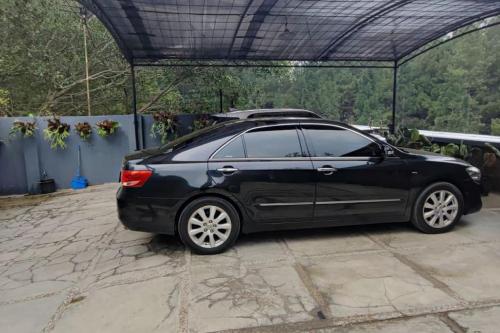 a black car is parked in a garage at PineHill on a 1740m land in Lembang