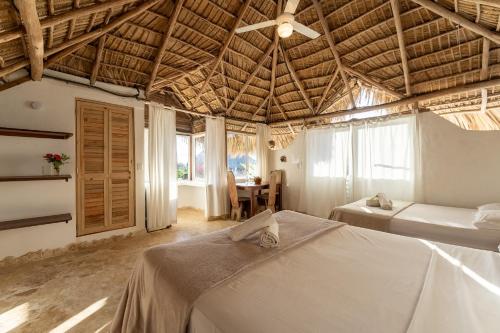Postel nebo postele na pokoji v ubytování Surfbreak B&B