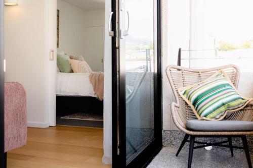 Кровать или кровати в номере The Rox - Luxe Hobart City Apartment