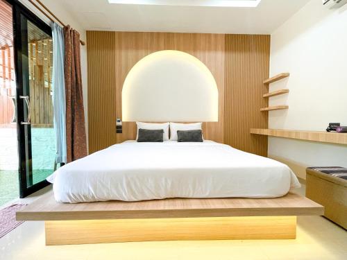 Ένα ή περισσότερα κρεβάτια σε δωμάτιο στο Dara Homestay