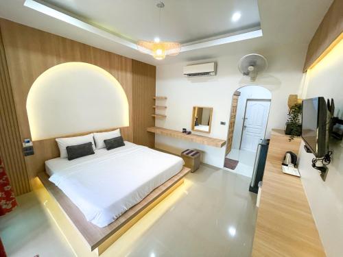 Ένα ή περισσότερα κρεβάτια σε δωμάτιο στο Dara Homestay