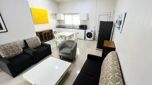 Virtuvė arba virtuvėlė apgyvendinimo įstaigoje Homely 3 bedroom apartment perfect for your dream getaway!