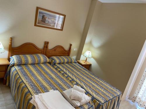 En eller flere senge i et værelse på Apartment in Mazarrón near La Isla Beach