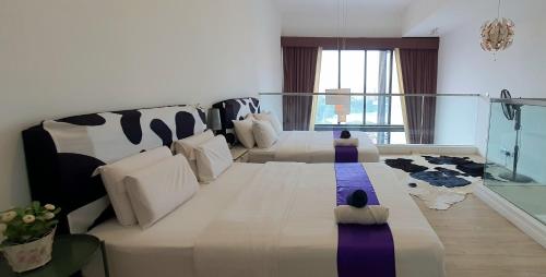 Ένα ή περισσότερα κρεβάτια σε δωμάτιο στο M City Ampang KL city