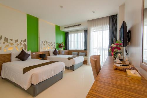Postel nebo postele na pokoji v ubytování Korapura Resort