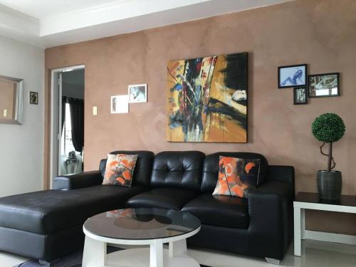 Posezení v ubytování 2BR condo at Kandi tower 2