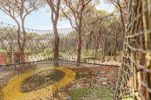 a batting cage with a large number on it at Gitavillage Le Marze in Marina di Grosseto