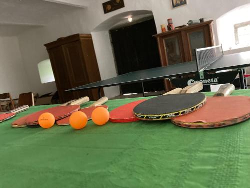 three skateboards sitting on top of a table at Chalupa u Brčáků in Ktiš