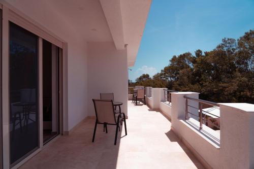 Un balcón o terraza de Villa 100 Palme