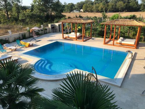 Piscina en o cerca de Villa 100 Palme
