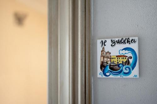 a sign on a door that says no turbulence at Buddha, borgo dei pescatori in Cervo