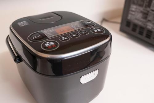 a toaster sitting on a counter next to a laptop at S-villa Nasu 9th in Nasu