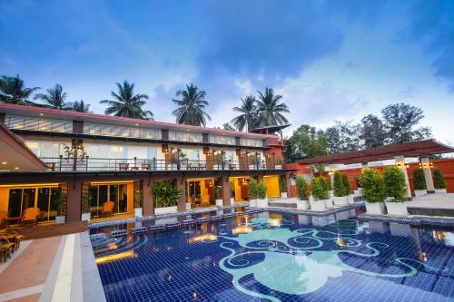 an exterior view of a resort with a swimming pool at Baan Grood Arcadia Resort & Spa in Ban Krut