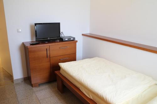 Katil atau katil-katil dalam bilik di Hotel Checkin