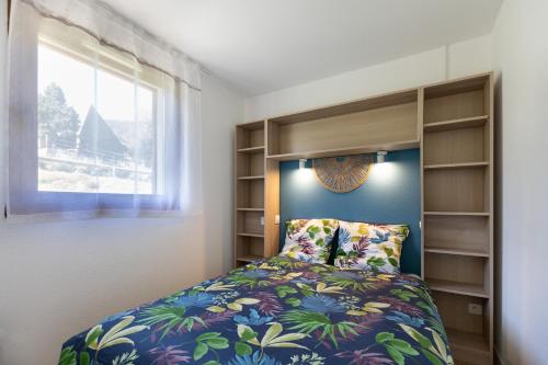 Llit o llits en una habitació de Pervenche - Charmant appartement vue montagne