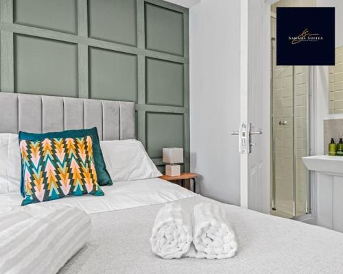 Ένα ή περισσότερα κρεβάτια σε δωμάτιο στο Luxury 6 bed 6 En-suite - Free Parking Reading