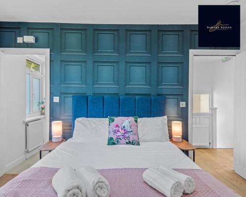 Ένα ή περισσότερα κρεβάτια σε δωμάτιο στο Luxury 6 bed 6 En-suite - Free Parking Reading