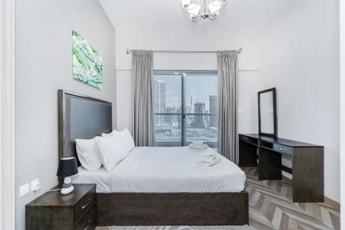 Postel nebo postele na pokoji v ubytování Family and Group Stay I Near Burj Khalifa