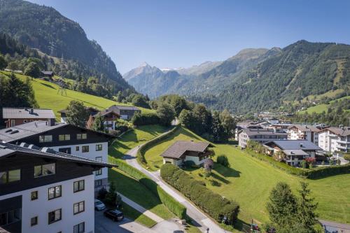 an aerial view of a village in the mountains at Ski Dome Apartments-Apartment VIVA & Heaven Holiday Chalet in Kaprun