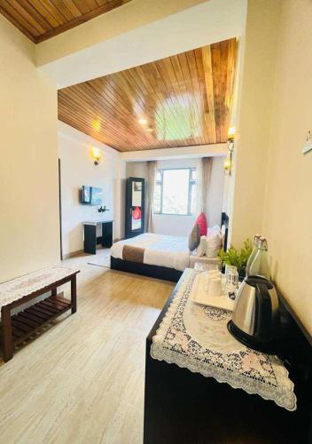 Ένα ή περισσότερα κρεβάτια σε δωμάτιο στο Maplewood Hotel & Spa