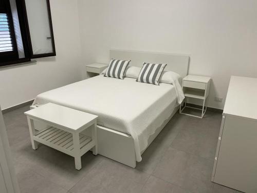 Postel nebo postele na pokoji v ubytování Villa da "Giacomino l'Americano"
