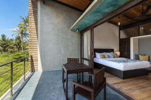 Inidi Leisure Luxury Villasにあるベッド
