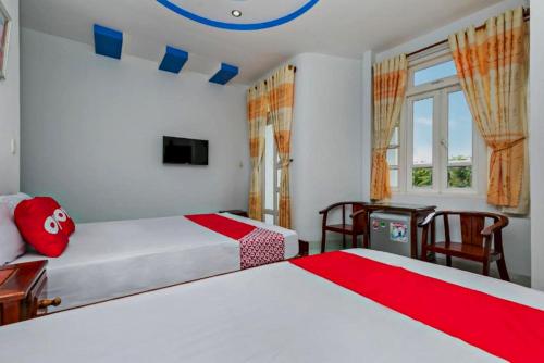 Кровать или кровати в номере OYO 998 Loan Anh 2 Hotel