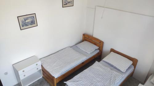 Postel nebo postele na pokoji v ubytování Nároďák Jaroměř ,UBYTOVÁNÍ