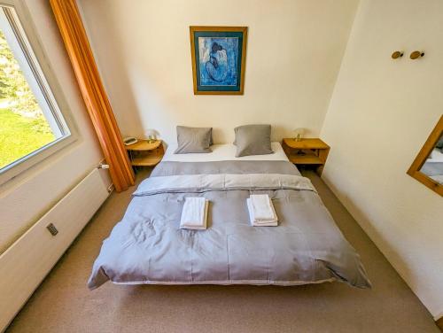 Voodi või voodid majutusasutuse Rothornblick 44 by Arosa Holiday toas