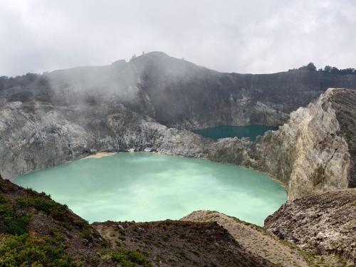 a view of a mountain lake in the mountains at FARILA LODGE in Kelimutu