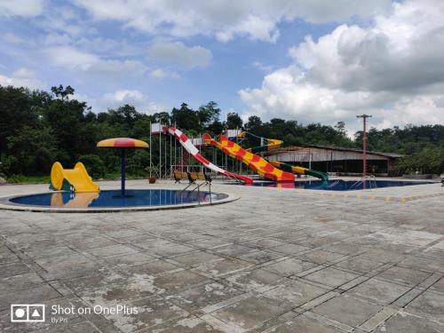a large playground with a slide and an inflatable at Kamal Farm Resort in Shenwa
