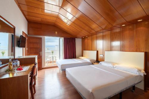 Poseidon Resortにあるベッド