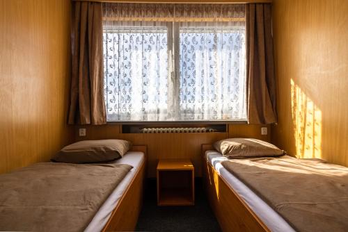 Hotel zimní stadion Slaný