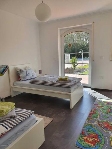 Ένα ή περισσότερα κρεβάτια σε δωμάτιο στο Ferienhaus Drees 5 Sterne