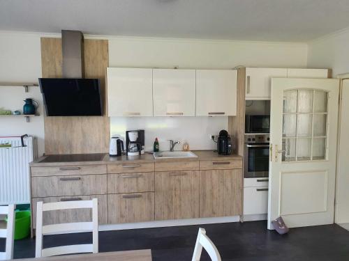 Η κουζίνα ή μικρή κουζίνα στο Ferienhaus Drees 5 Sterne