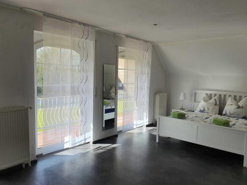 Ένα ή περισσότερα κρεβάτια σε δωμάτιο στο Ferienhaus Drees 5 Sterne
