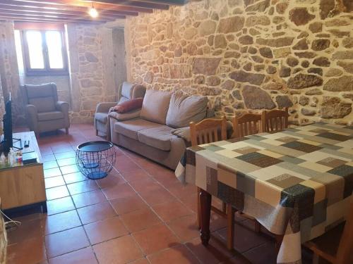 Posezení v ubytování VibesMuxía- Casa Rural Castelo