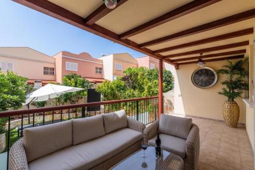 Un balcón o terraza de Comfortable Villa Private Garden